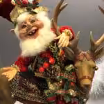Mark Roberts Santa doll riding a reindeer