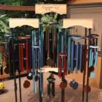 Display of Corinthian Bells wind chimes for sale in a store in Cincinnati, OH