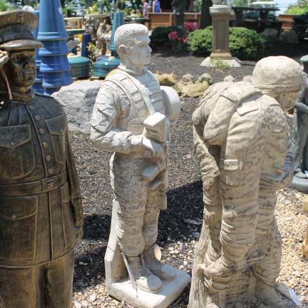 Collection of military soldier statues sitting outside for sale in Cincinnati, OH